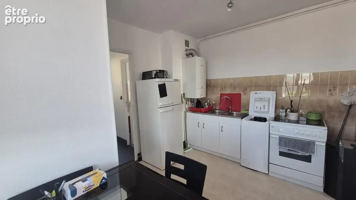 Appartement T2 / place de stationnement et greniers - photo 2