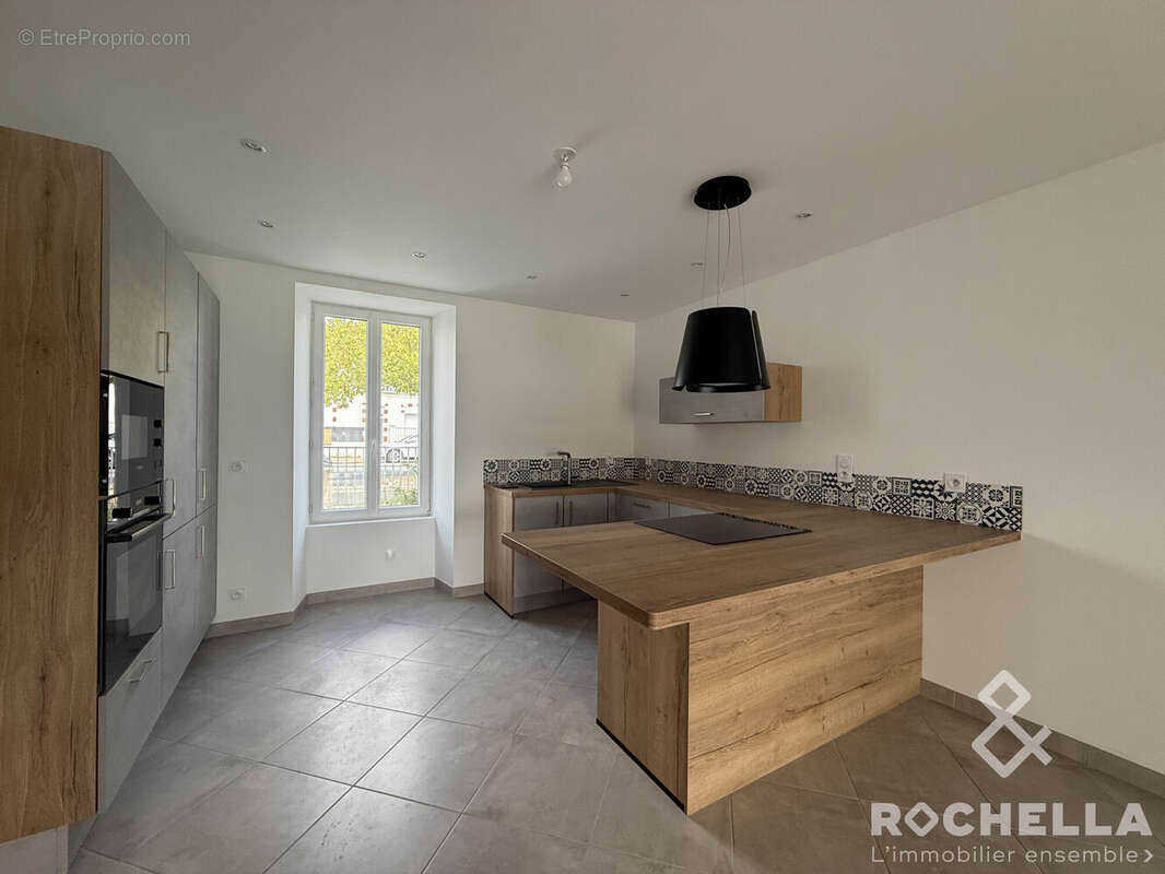 Maison 96 m² à Tonnay-Charente  - photo 3