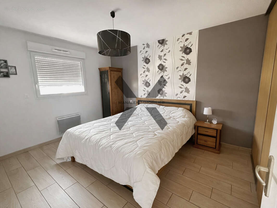 Maison à SAINT-GERMAIN-LESPINASSE