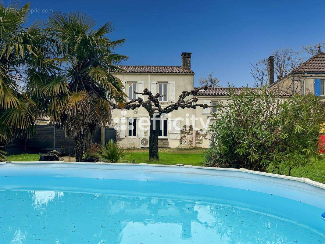 Maison à COGNAC