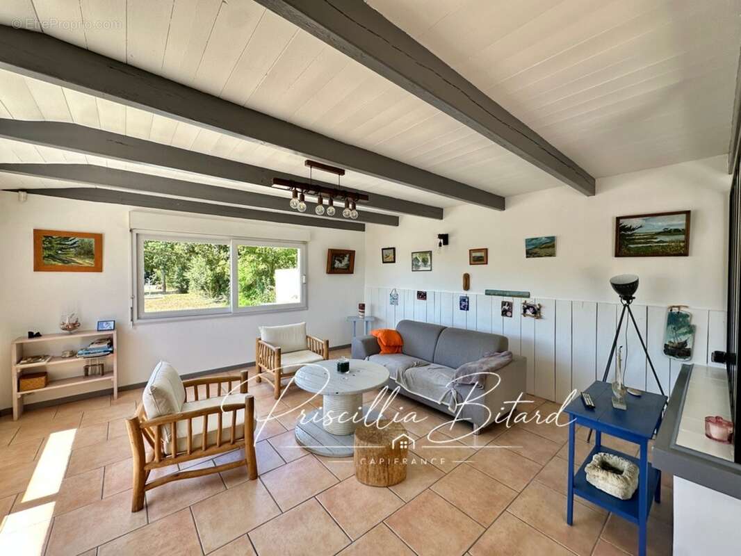Le charme d'un environnement verdoyant allié au confort d'une maison familiale - photo 2