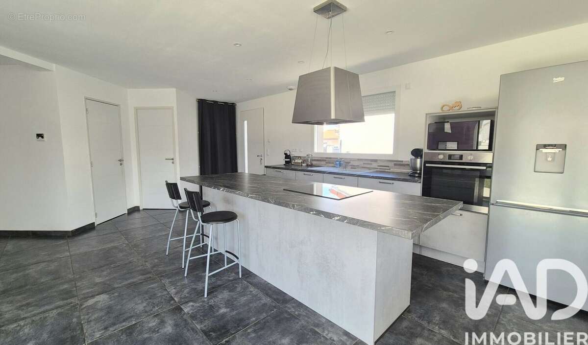 Photo 3 - Maison à ANDREZIEUX-BOUTHEON