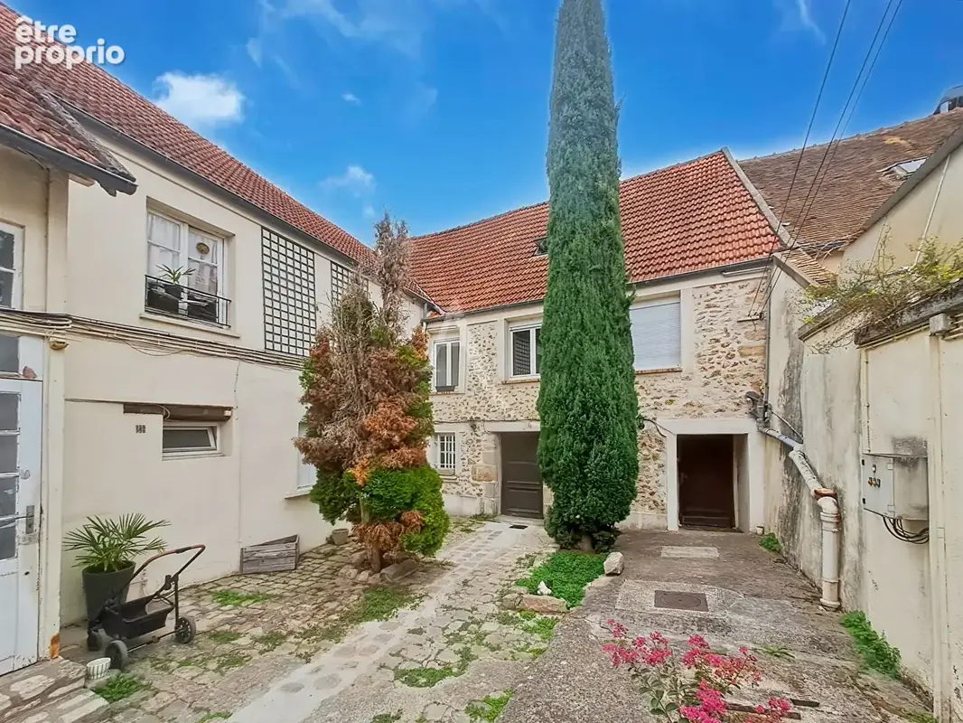 ARPAJON - Grande Rue - COUP DE COEUR - Appartement T2 de charme en dernier étage - photo 11