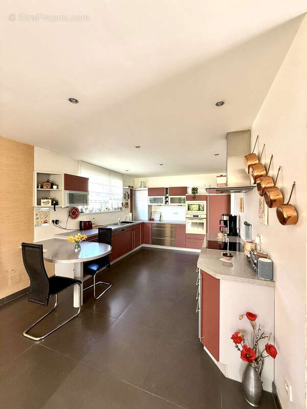Berstett - L’esprit maison dans une petite copropriété   5 pièces de 141,63 m2 avec jardin, terrasse, garage - photo 8