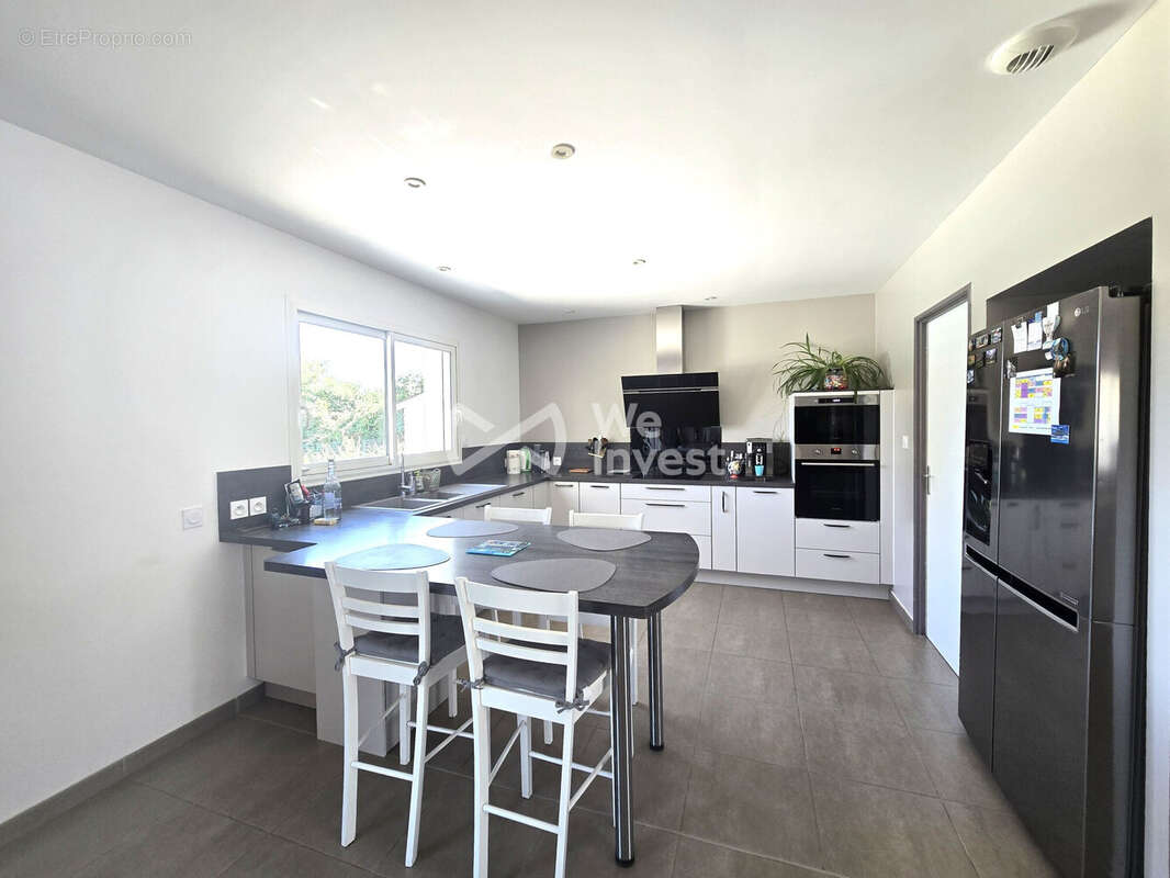 Maison 110 m² à Angeville  - photo 7