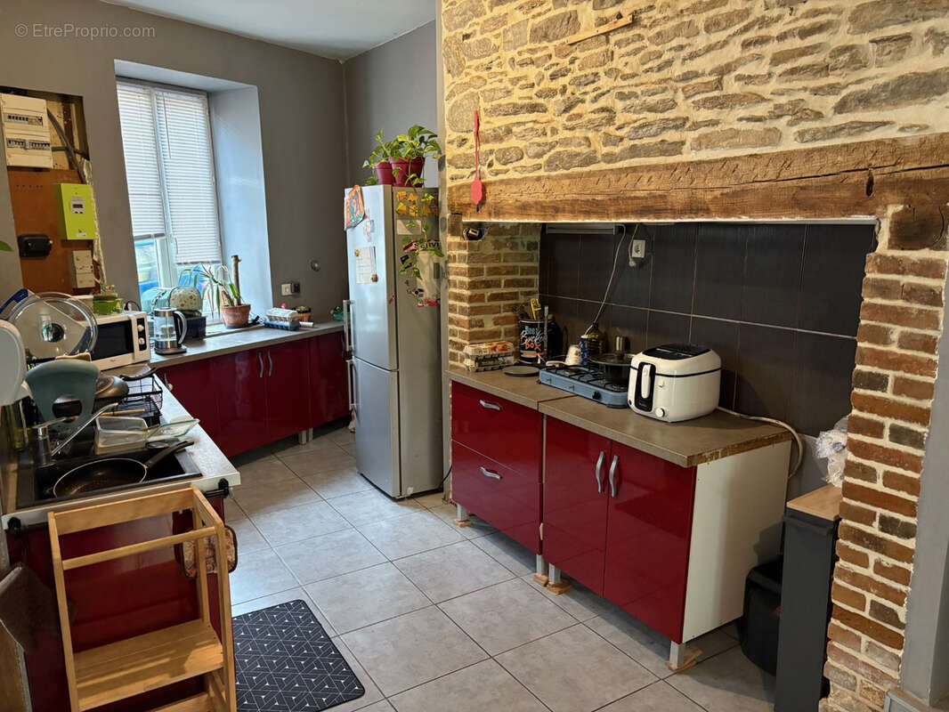 Coussac Bonneval maison de 6 pièces  proche des commerces avec cour et garage - photo 4