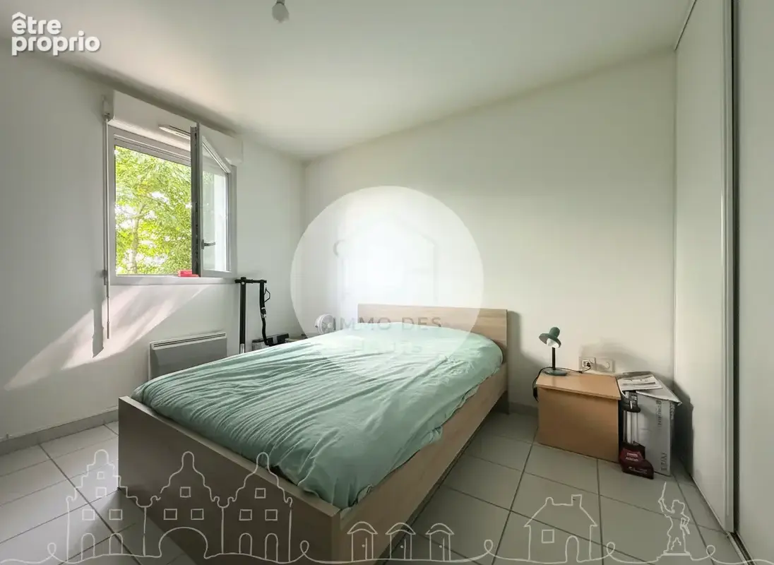 Appartement T3 de 57 m2 avec terrasse et 2 parkings, vendu loué - photo 2