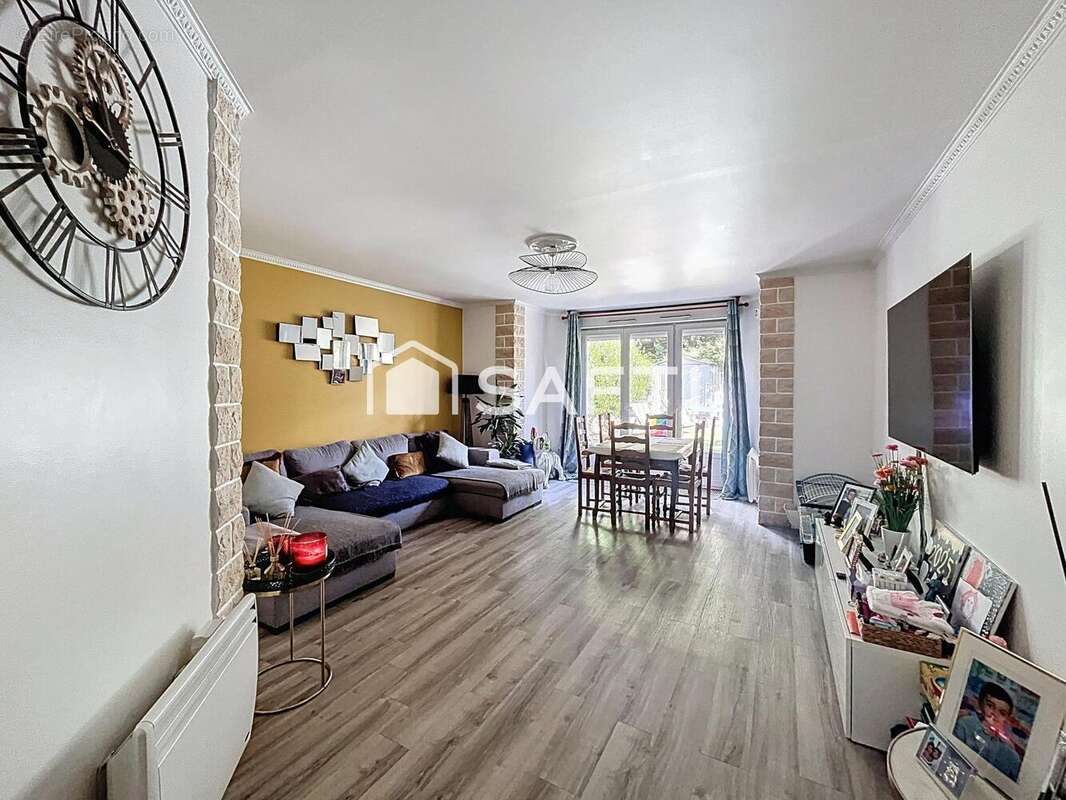 Photo 2 - Maison à AUBERVILLIERS