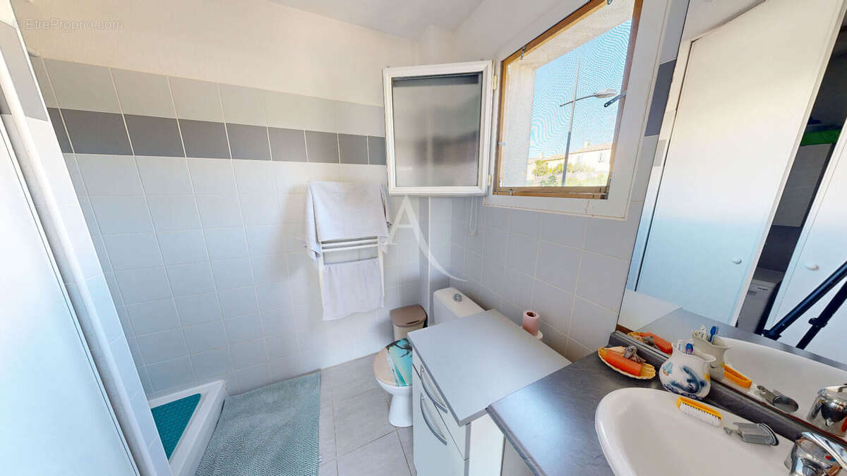 Appartement T2 avec terrasse et 2 stationnements - Quartier Réveillon - photo 9