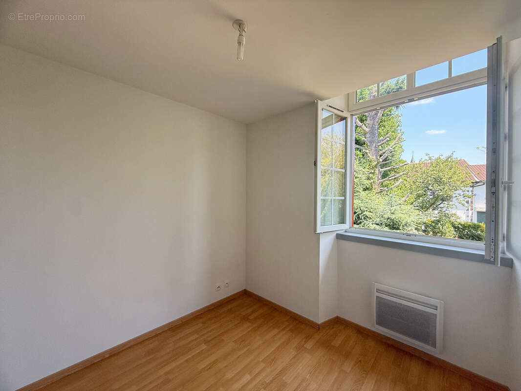 Appartement T3 avec balcon et place de parking - photo 13