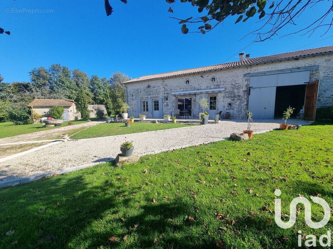 Photo 1 - Maison à AUBIGNE