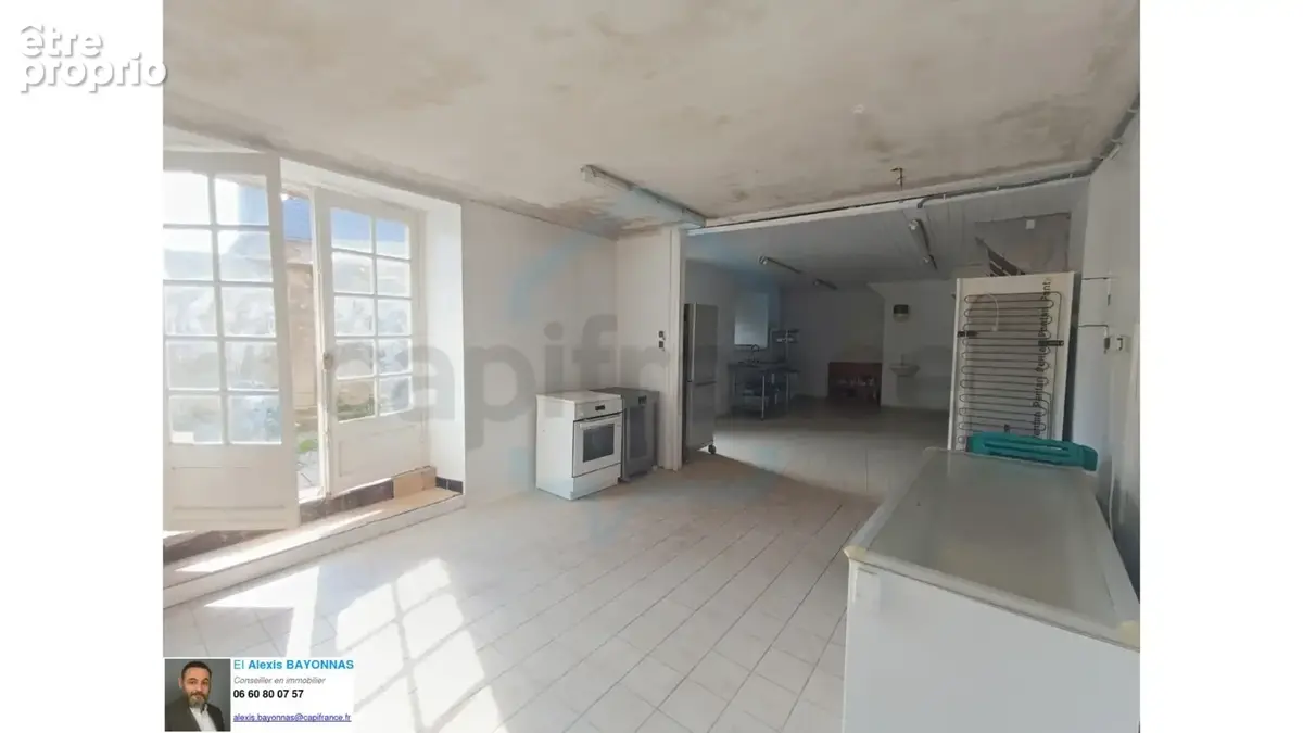 Ensemble immobilier mixte 420 m² – Centre-ville de Châteauneuf-du-Faou - photo 11