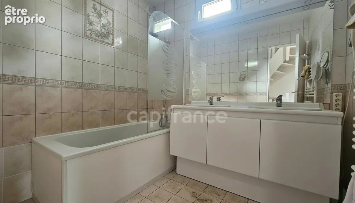 Maison 85 m² – Quartier Grande Ile – Jardin, terrasse, garage et belle luminosité - photo 7