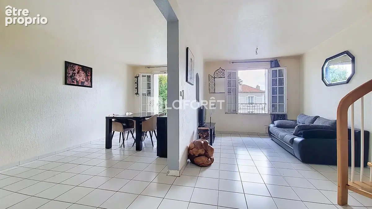 Un duplex aux volumes généreux sous les toits - photo 3
