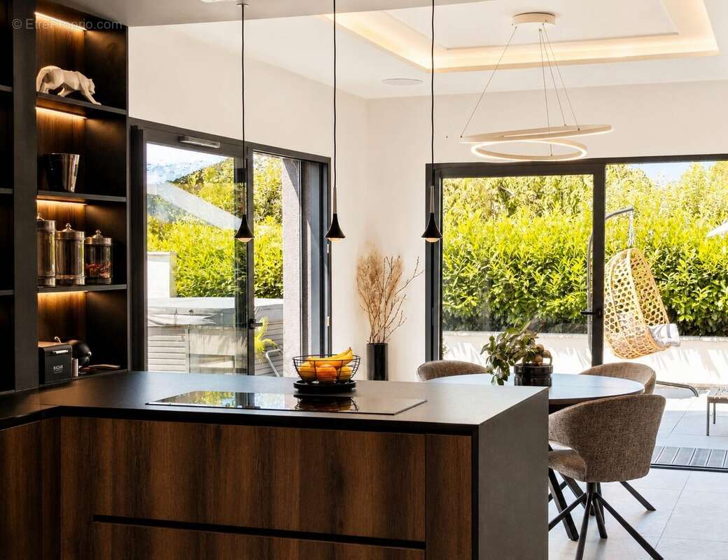 Maison 133 m² à Saint-Genis-Pouilly  - photo 9