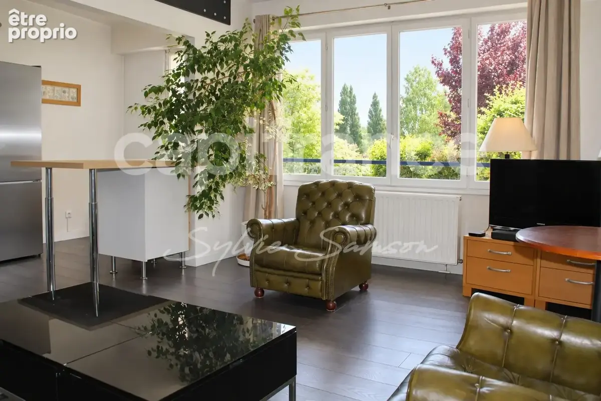 Mantes-la-Jolie – Appartement T3 traversant de 61 m² avec parking, cave et séchoir - photo 6