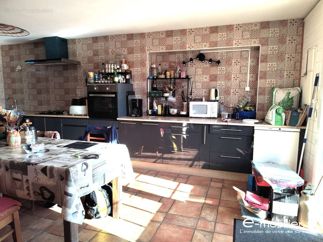Pièce à vivre / Coin cuisine  - Maison à GROIX