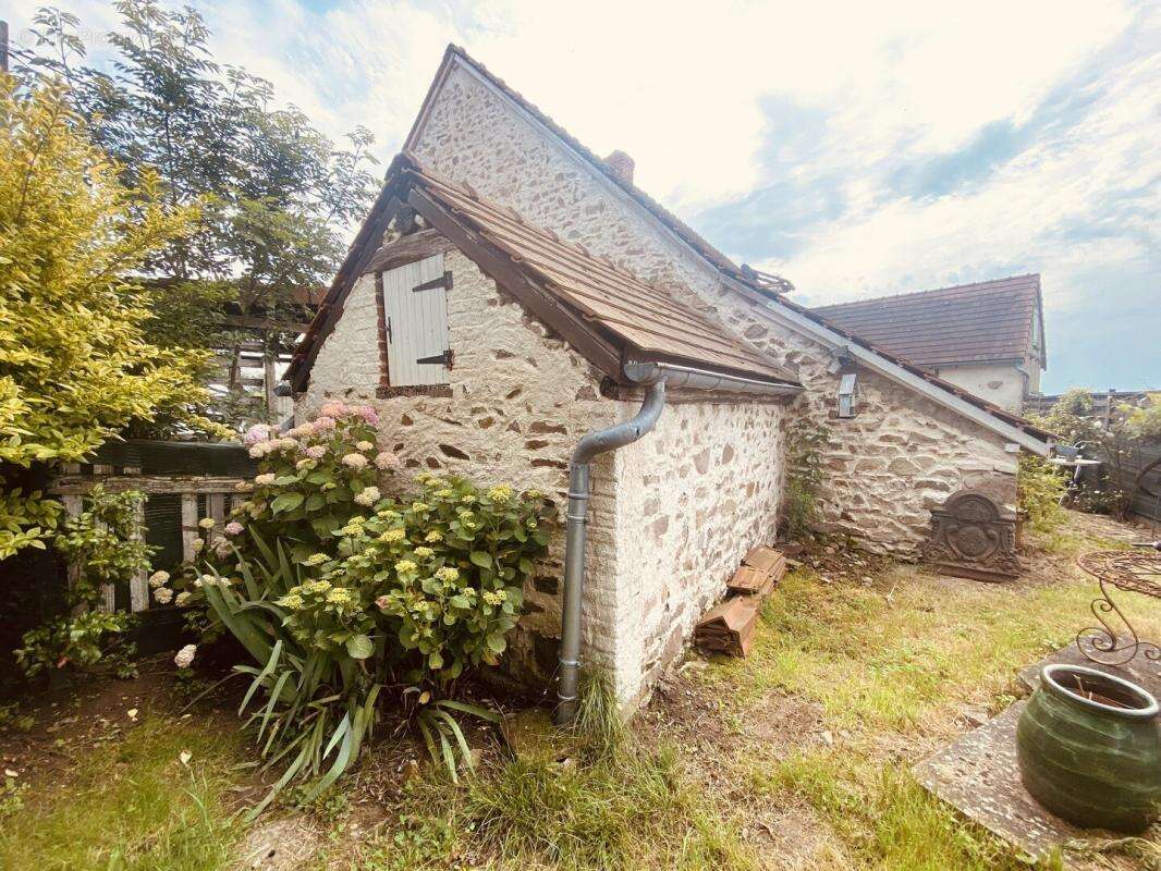 Maison mitoyenne spacieuze avec jardin - photo 15