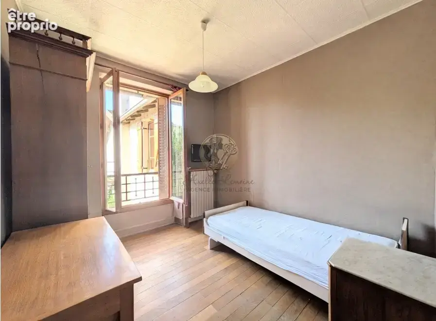 Rare à Saint-Genis-Laval   Maison d'une surface de 200m2 sur 810m2 de terrain - photo 12