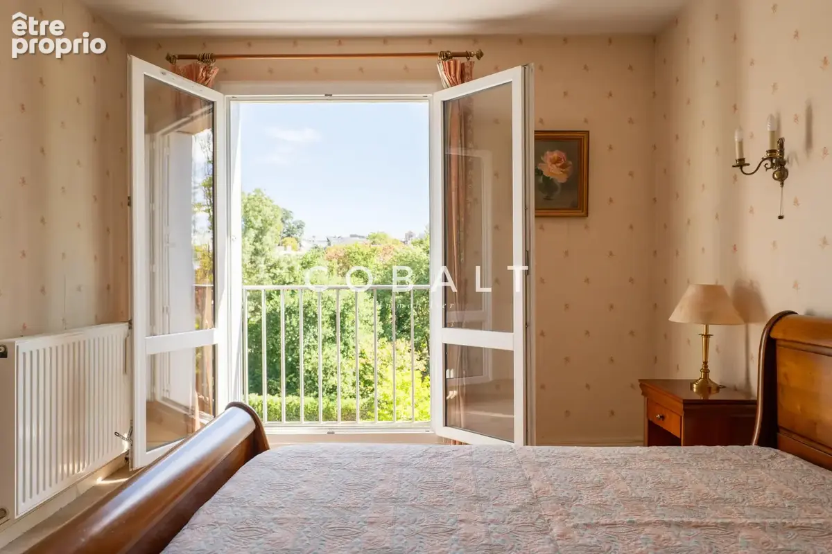NANTES CANCLAUX   EXCLUSIVITÉ   Appartement T3 de 82 m2 en étage élevé avec balcon, grande cave de 9 m2 et par - photo 7