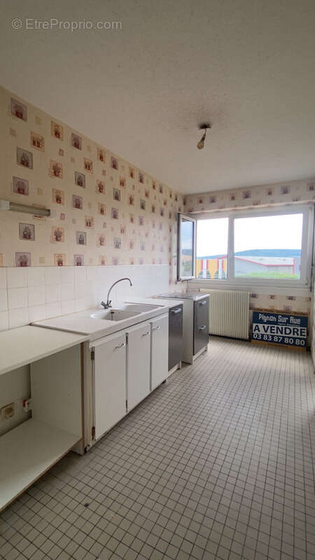 Appartement à rénover de 67 m2 habitables proche centre ville - photo 5