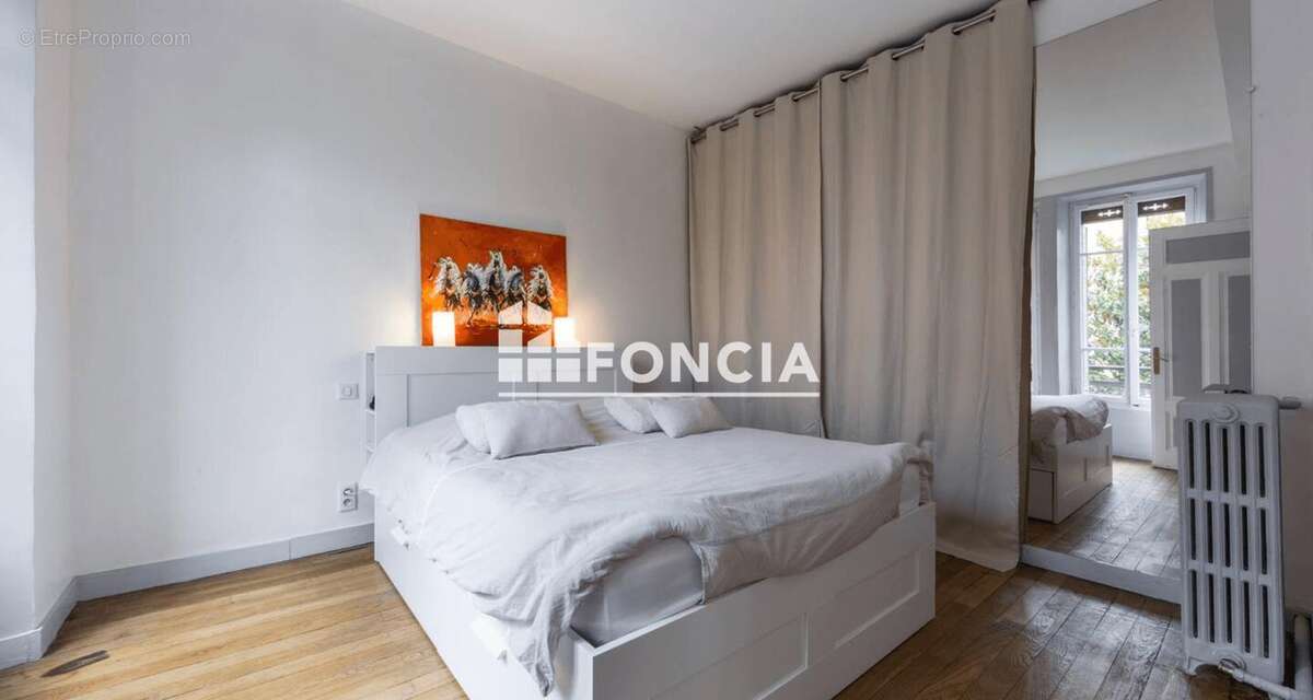 Annecy centre – T4 traversant de 84 m², balcons, parking et cave - photo 6