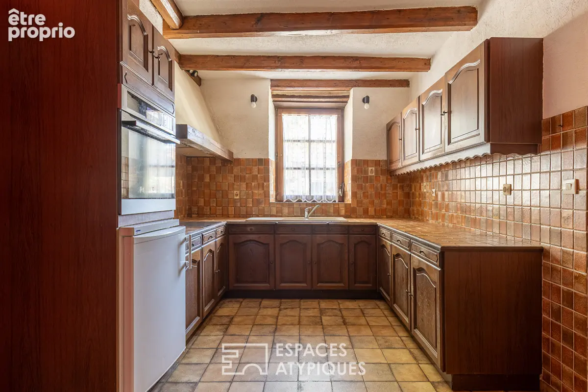 Maison lorraine aux poutres apparentes à réinventer et son vaste terrain - photo 10
