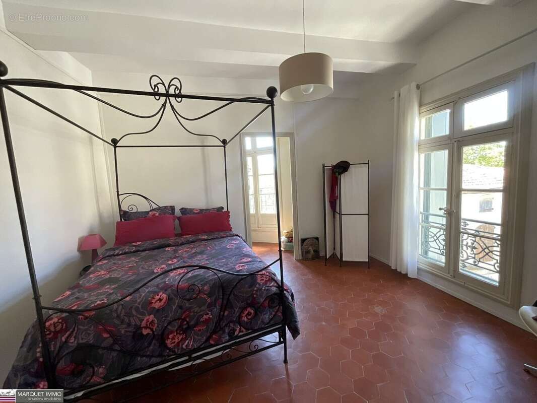 Le charme intemporel d'une Maison de Maitre T6 offrant 176 m² donnant sur patio intimiste avec piscine, nichée au coeur de Corne - photo 15