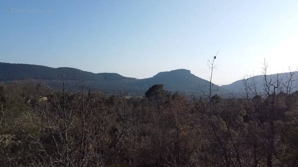 Terrain à BAGNOLS-EN-FORET
