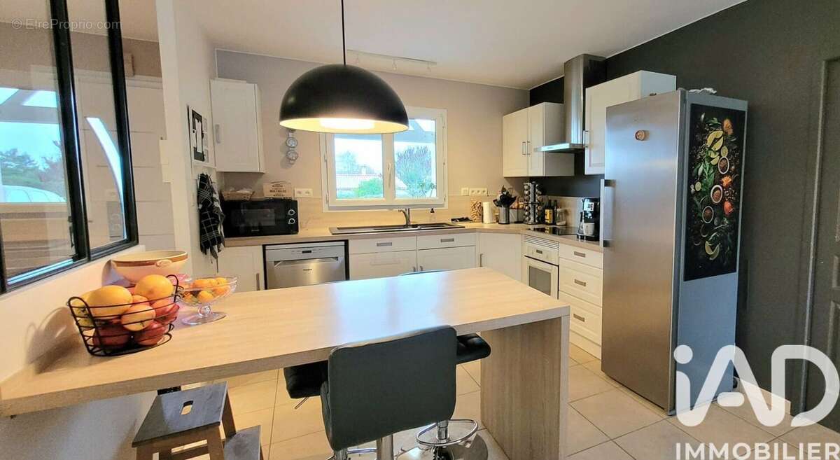 Photo 2 - Maison à ROCHES-PREMARIE-ANDILLE